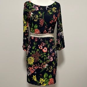 Dark Navy long sleeve low cut back dress with neon floral print and lace waist